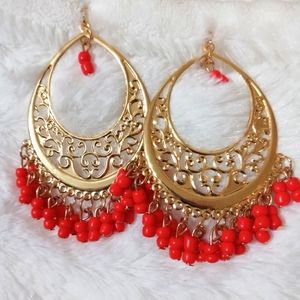 Red gold tone clip on earrings